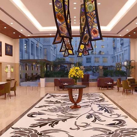 Lemon Tree Premier, Delhi Airport Hotel New Delhi Luaran gambar The lobby of the Taj Bengal