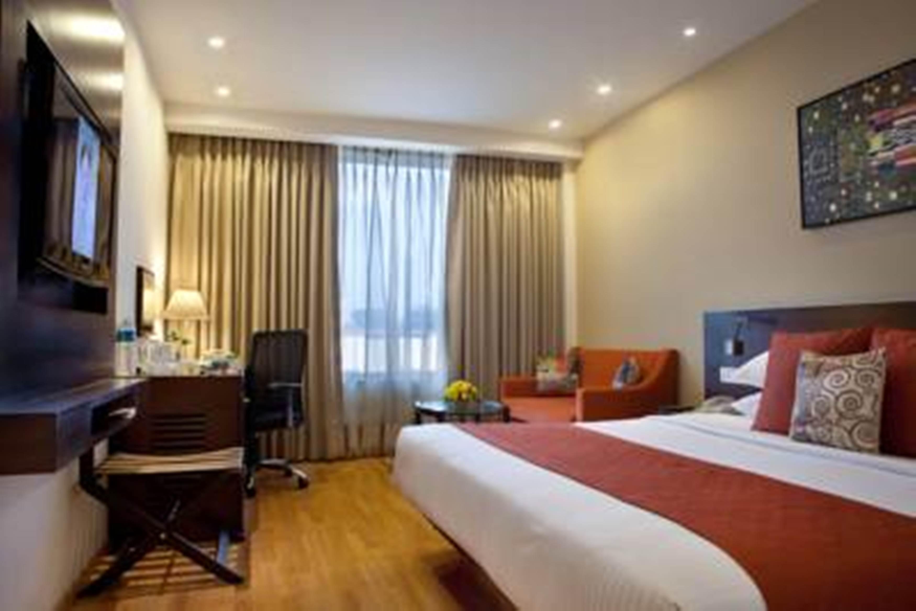 Lemon Tree Premier, Delhi Airport Hotel New Delhi Luaran gambar A room at the hotel
